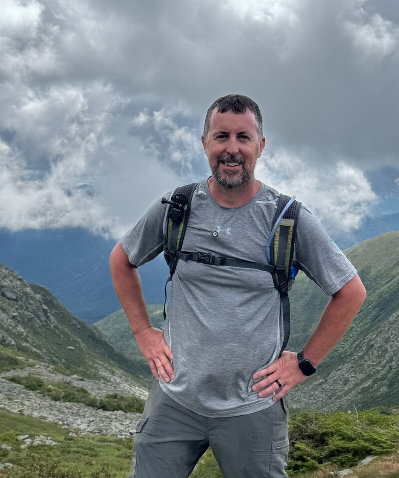 Author Steven Gallaher hiking in the mountains